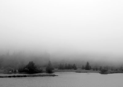 The mist rolls in on a lake in Ceredigion